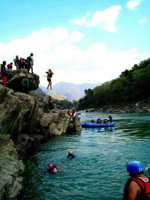 Experience the Thrill of River Rafting and River Jumping in Rishikesh